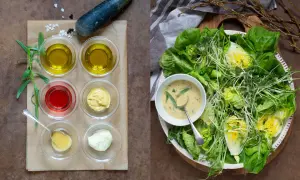 Ingredienser för dressing till sallad: olivolja, vinäger, senap, majonnäs och örter. En fräsch sallad med gröna blad och groddar.