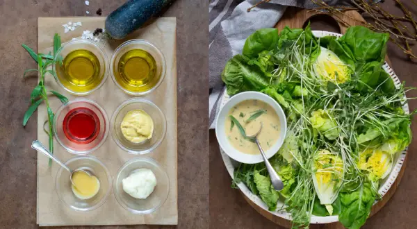 Ingredienser för dressing till sallad: olivolja, vinäger, senap, majonnäs och örter. En fräsch sallad med gröna blad och groddar.